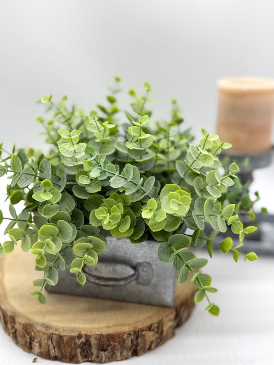 realistic faux eucalyptus in metal drawer vase