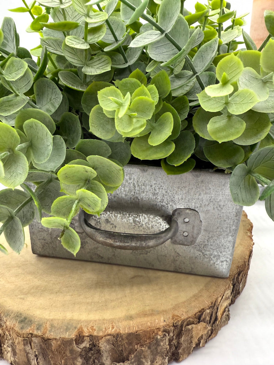 realistic looking eucaluptus stems in galvanized square drawer vase