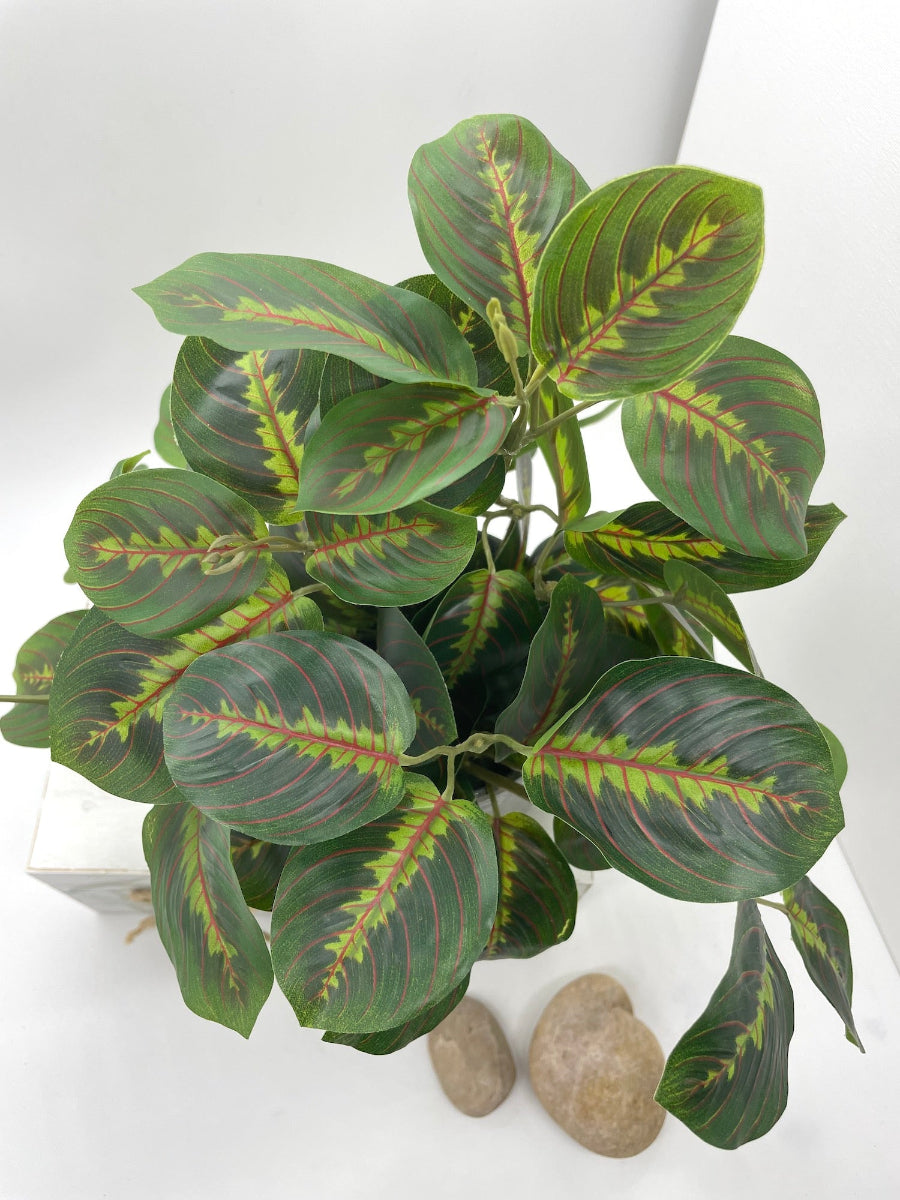 view from top and close up Green Fake Plants with green leaves in Gray Ceramic Pot