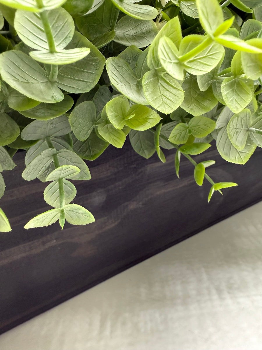 handmade greenery centerpiece with faux eucalyptus in wooden long planter