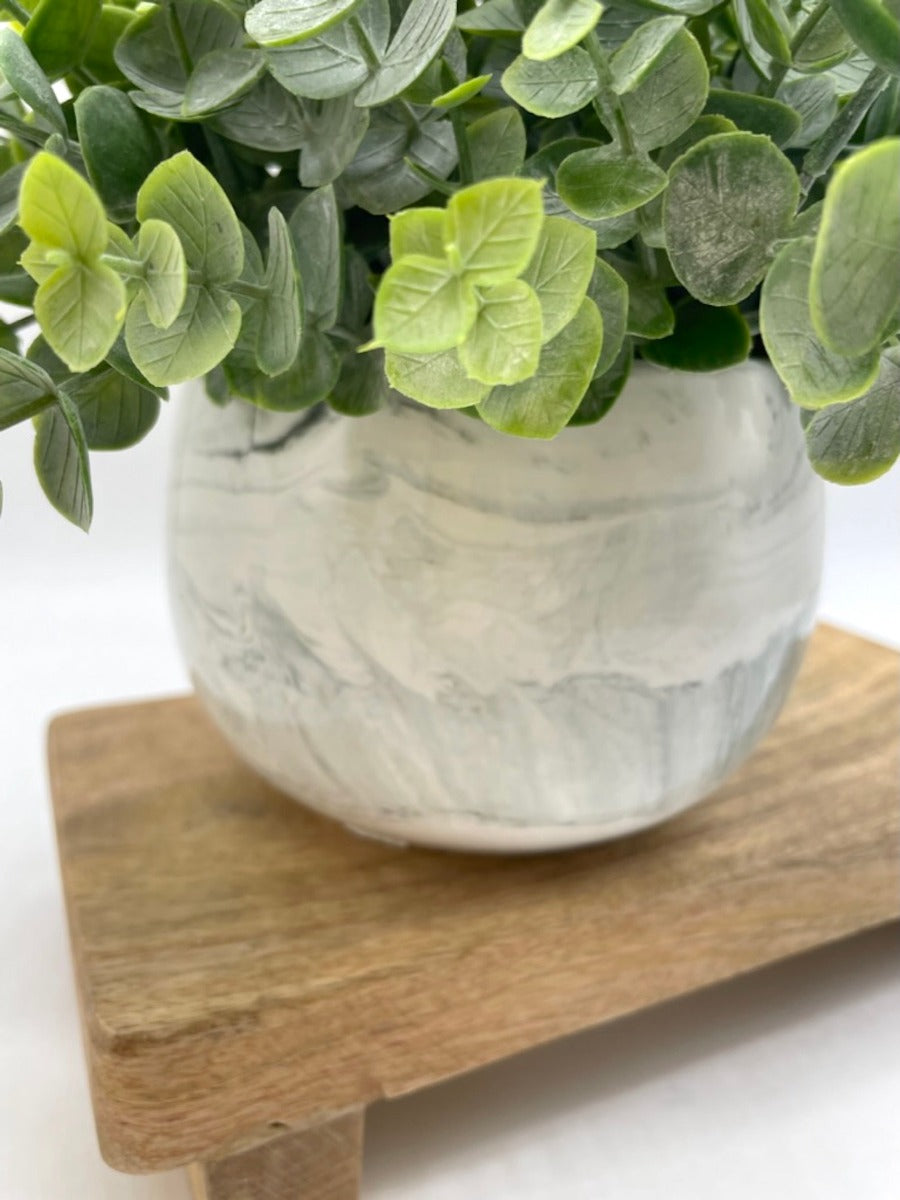 close up for marble-like ceramic pot for faux eucalyptus arrangement