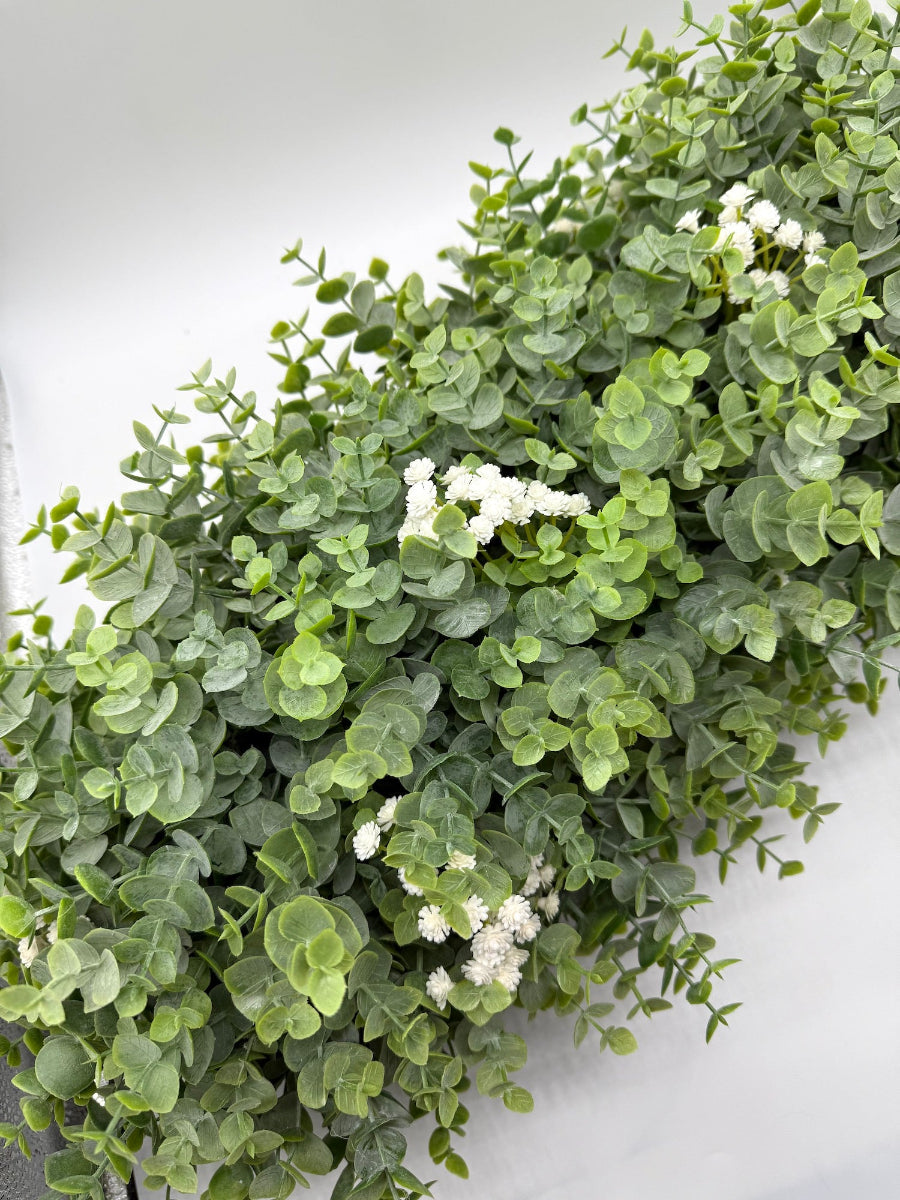 realistic looking lush greenery arrangement