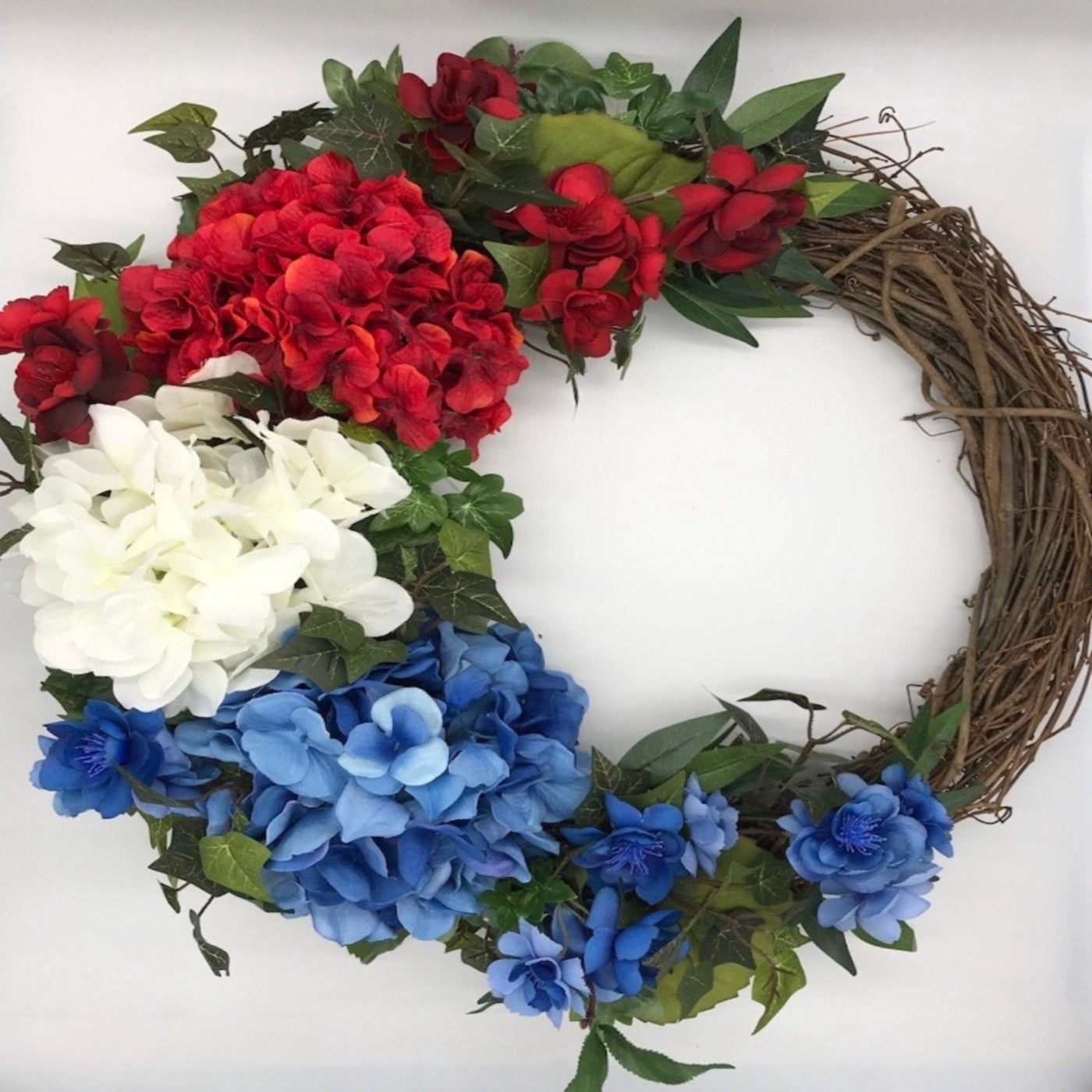 4th of July Wreath for Front Door with red white blue hydrangea flowers and greenery on grapevine round base, Elegant Patriotic Wreath