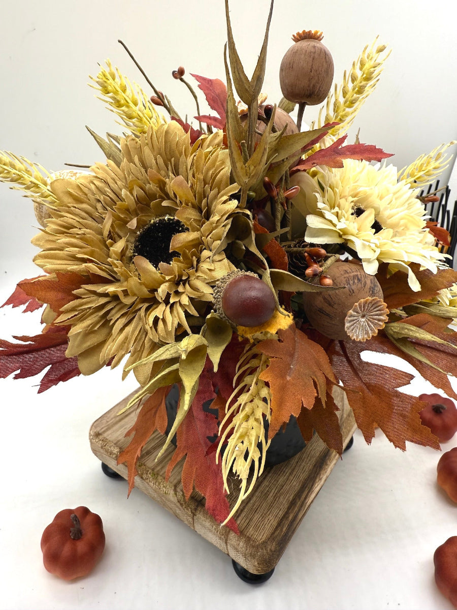 Fall Centerpiece in Black Vase with faux flowers, leaves, pumpkins, wheat stems, poppy heads