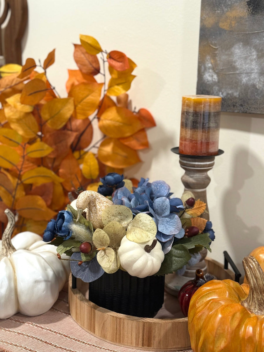 Blue Autumn Floral Arrangement with dusty blue hydrangea, white pumpkin, autumn foliage in Black Ceramic Vase 