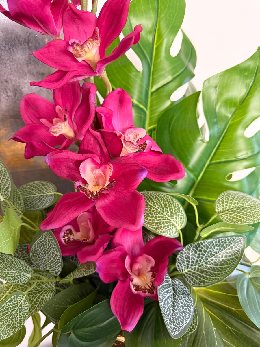 artificial Pink Orchid Arrangement with variety of greenery in tall gold vase