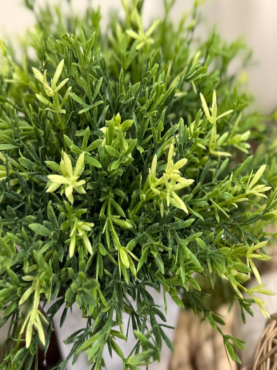 Close-up of a vivid green artificial plant 
