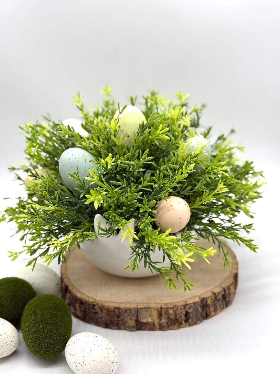 easter arrangement with realistic greenery and pastel colors faux eggs in white ceramic bunny vase