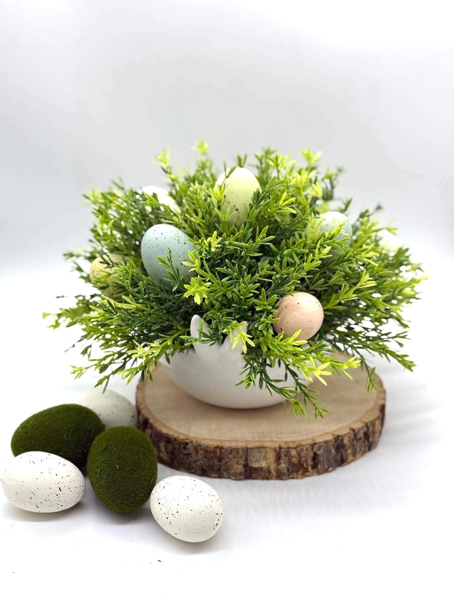 unique handmade easter centerpiece in white ceramic bunny vase with realistic geenery and faux eggs in pastel colors