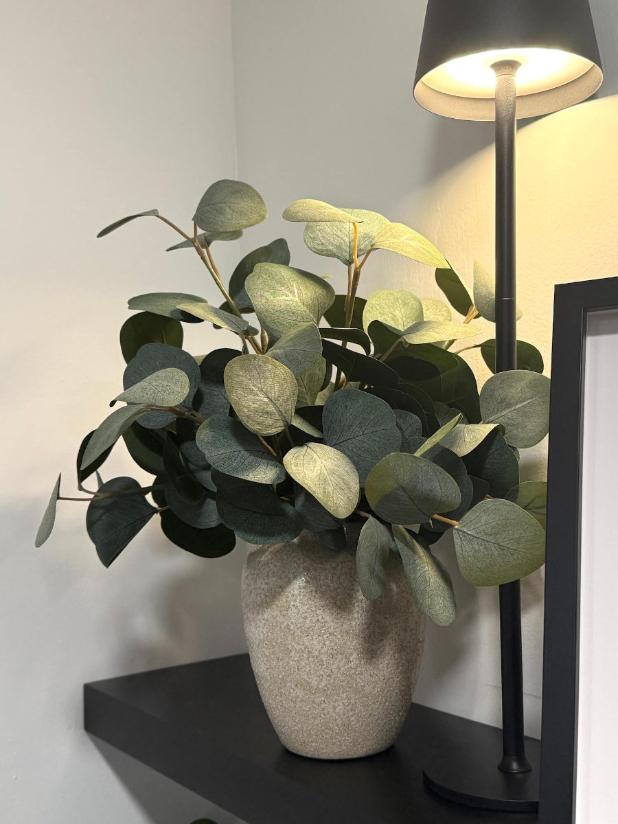 elegant realistic silver dollar eucalyptus in stoe like vase