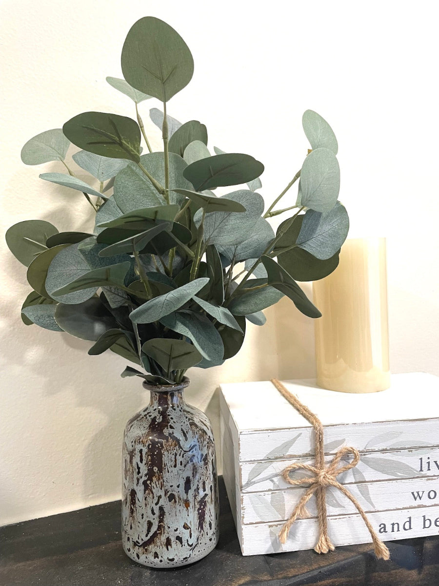 Silver Dollar Eucalyptus Stems in ceramic Vase in gray and brown