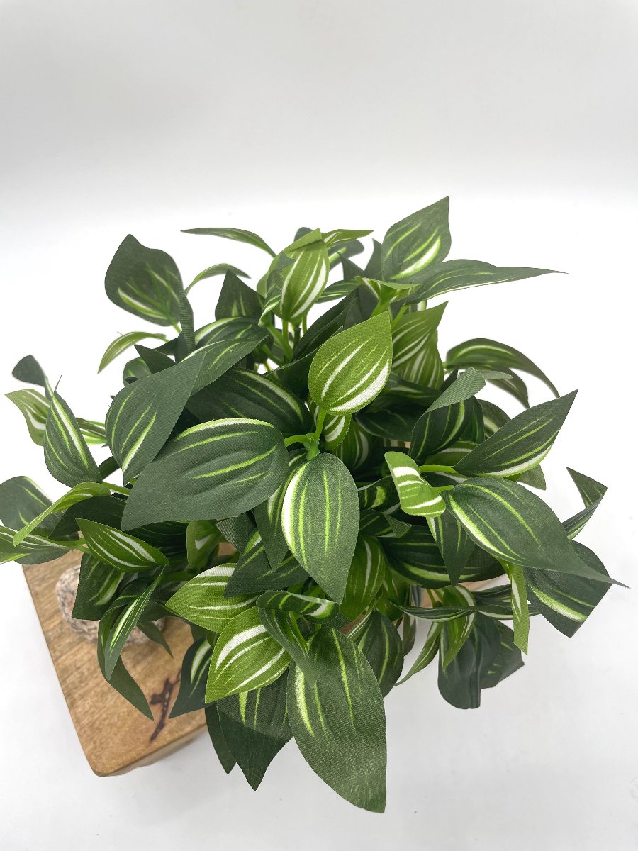 close up and view from top of Small Faux Plant in White Ceramic Pot