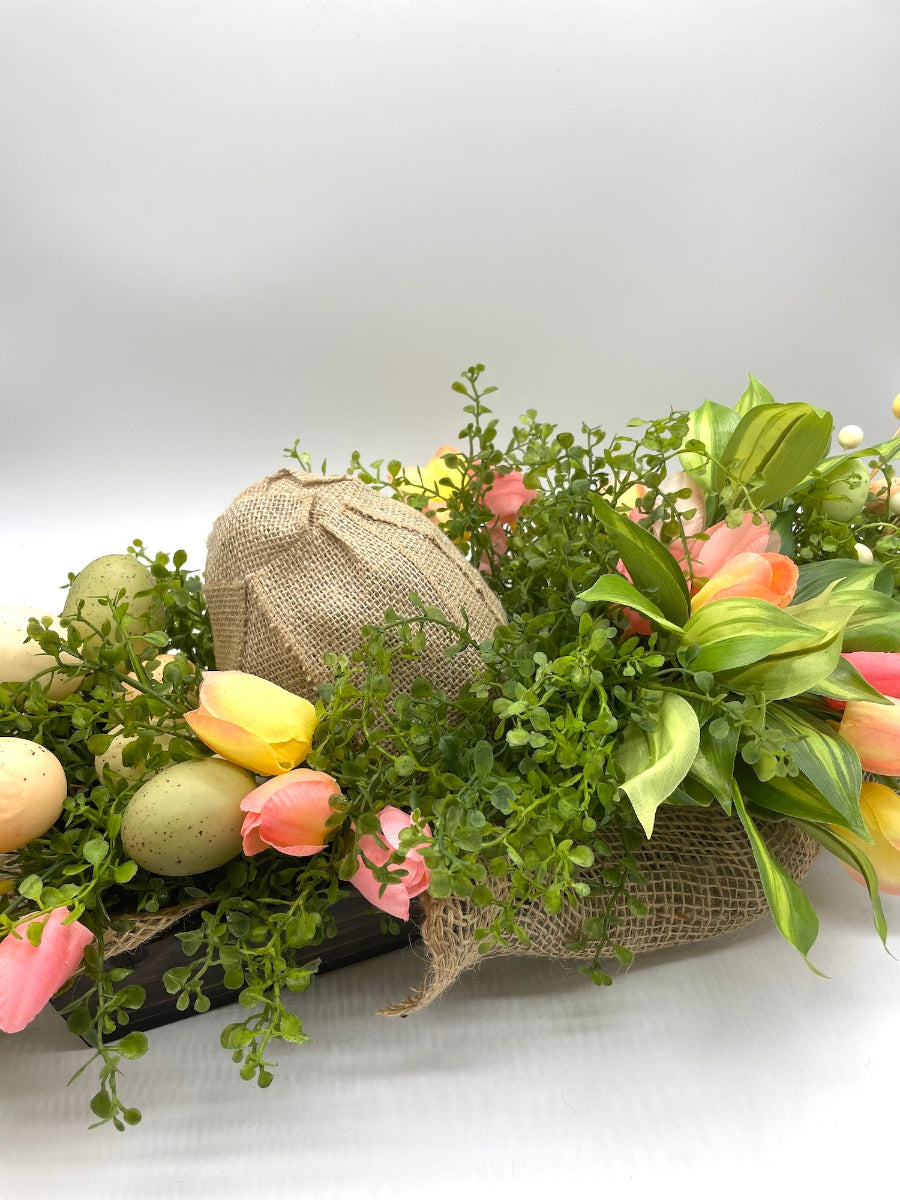 floral arrangement with easter eggs