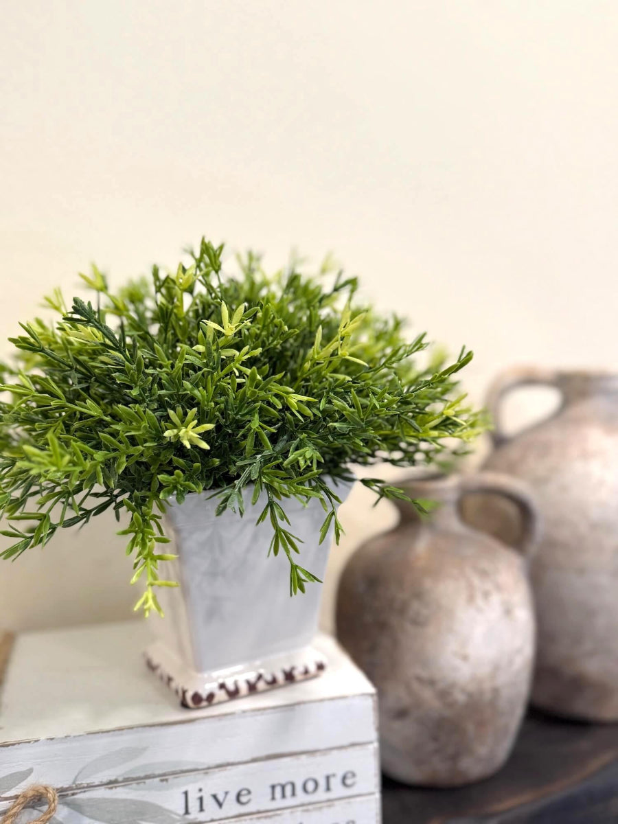 realistic looking vivid green faux plant in white square ceramic vase perfect for shelf and any table