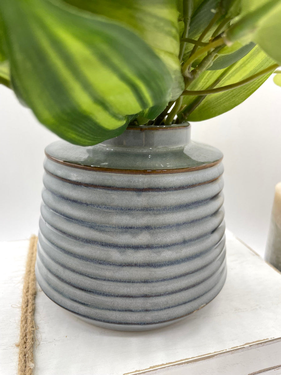 close up view of Gray Vase with fake plant