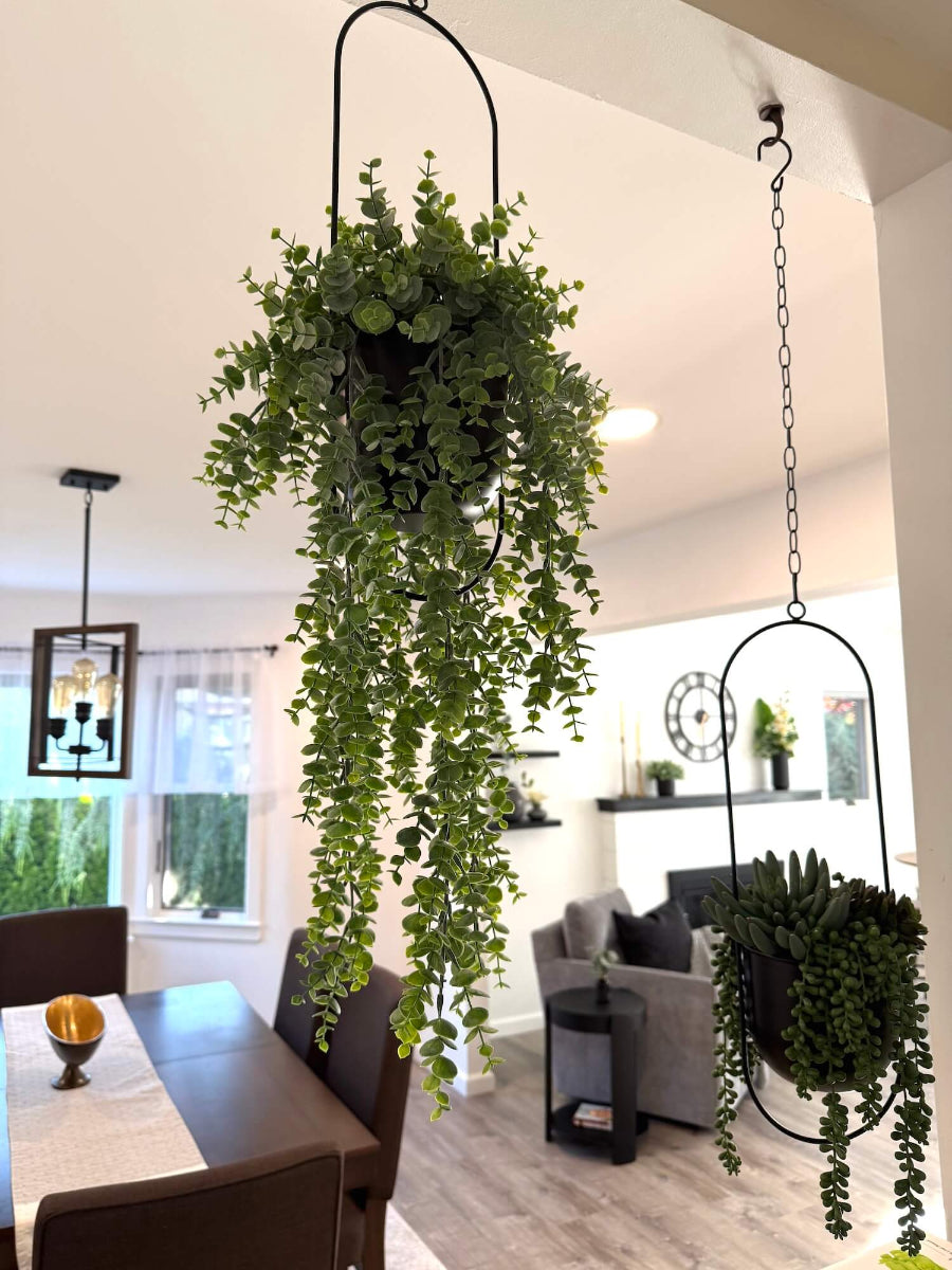 hanging faux plant eucalyptus with dripping stems in metal black planter