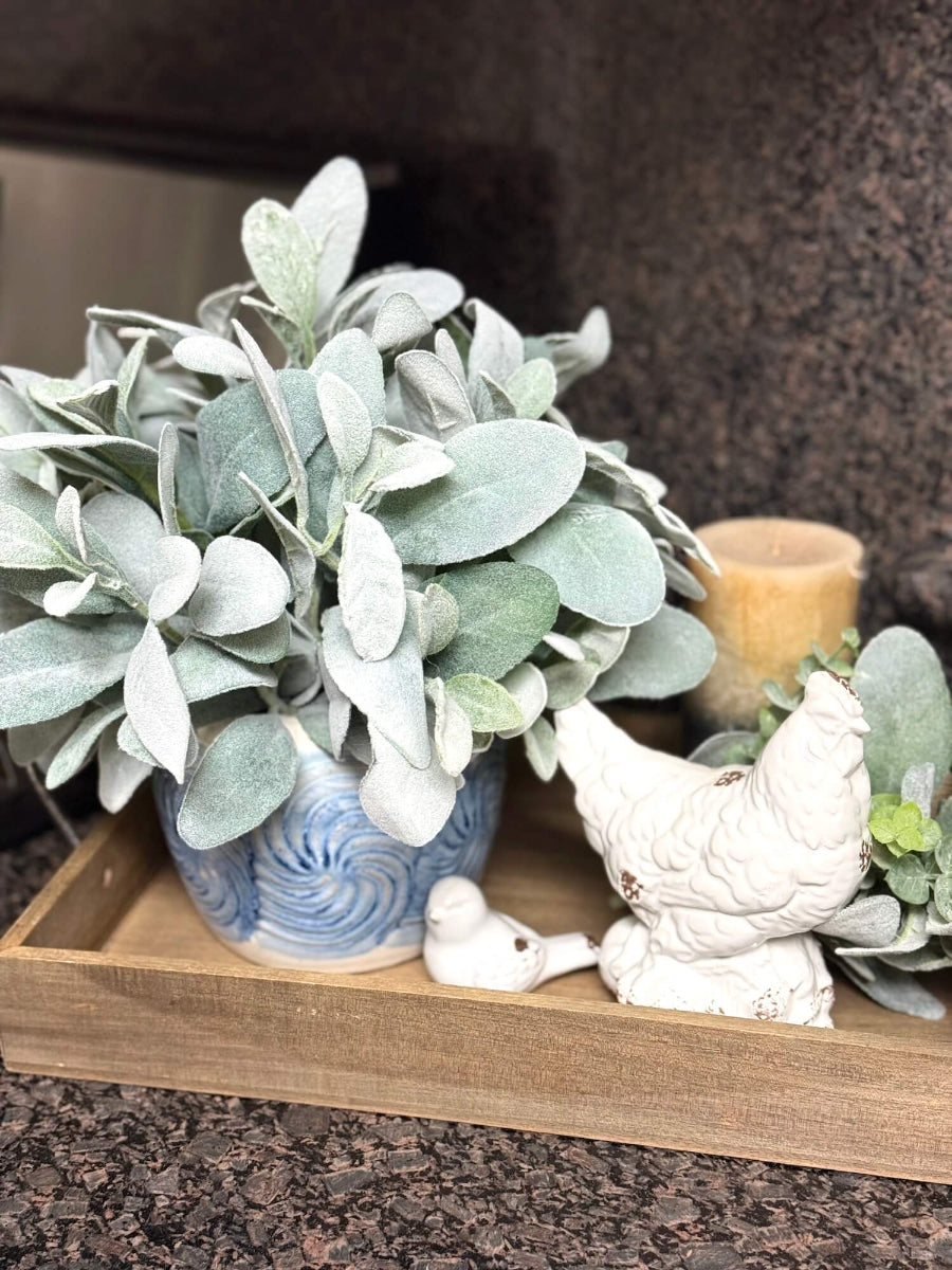 faux lambs ear arrangement in bluse vase for tray decor