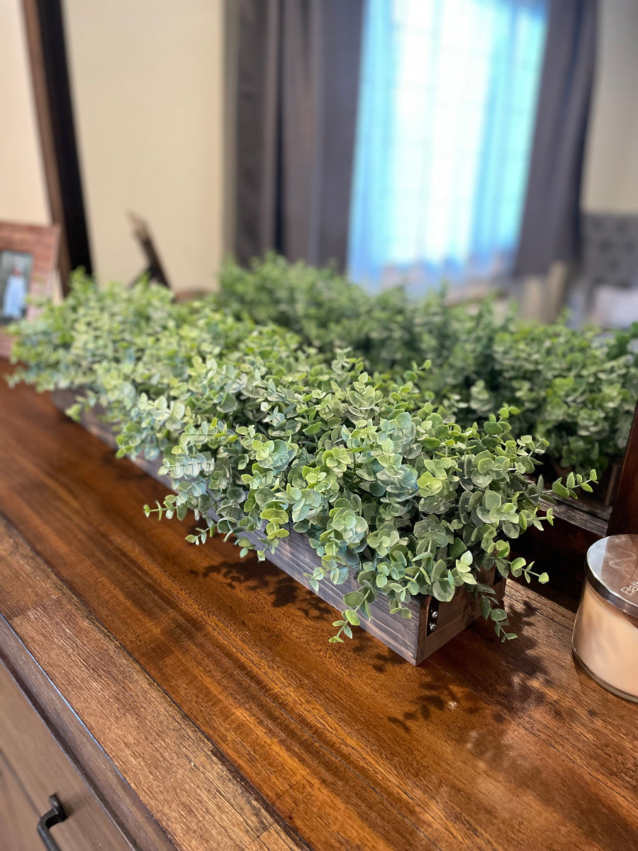 Faux Eucalyptus Arrangement in Long Wooden Plante with handles staines in expresso color