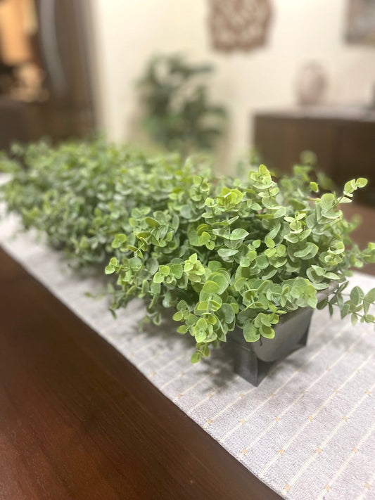realistic Faux Eucalyptus Arrangement in a long galvanized metal planter with handles