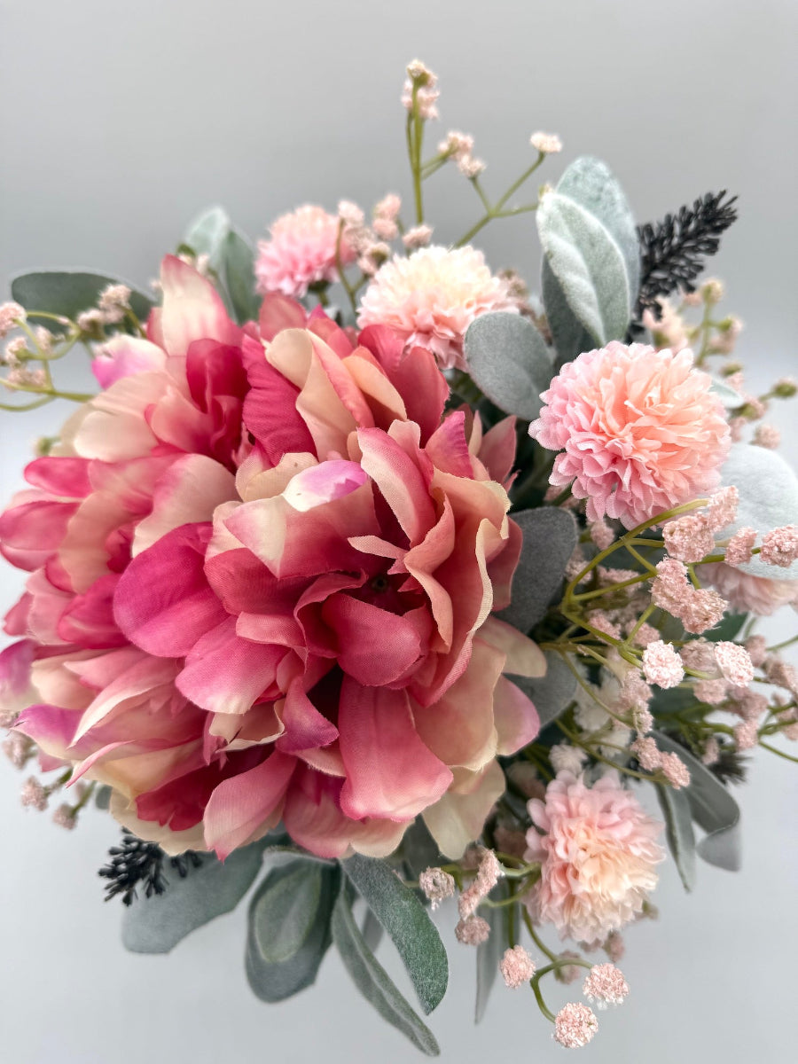 lush realistic floral centerpiece in pink