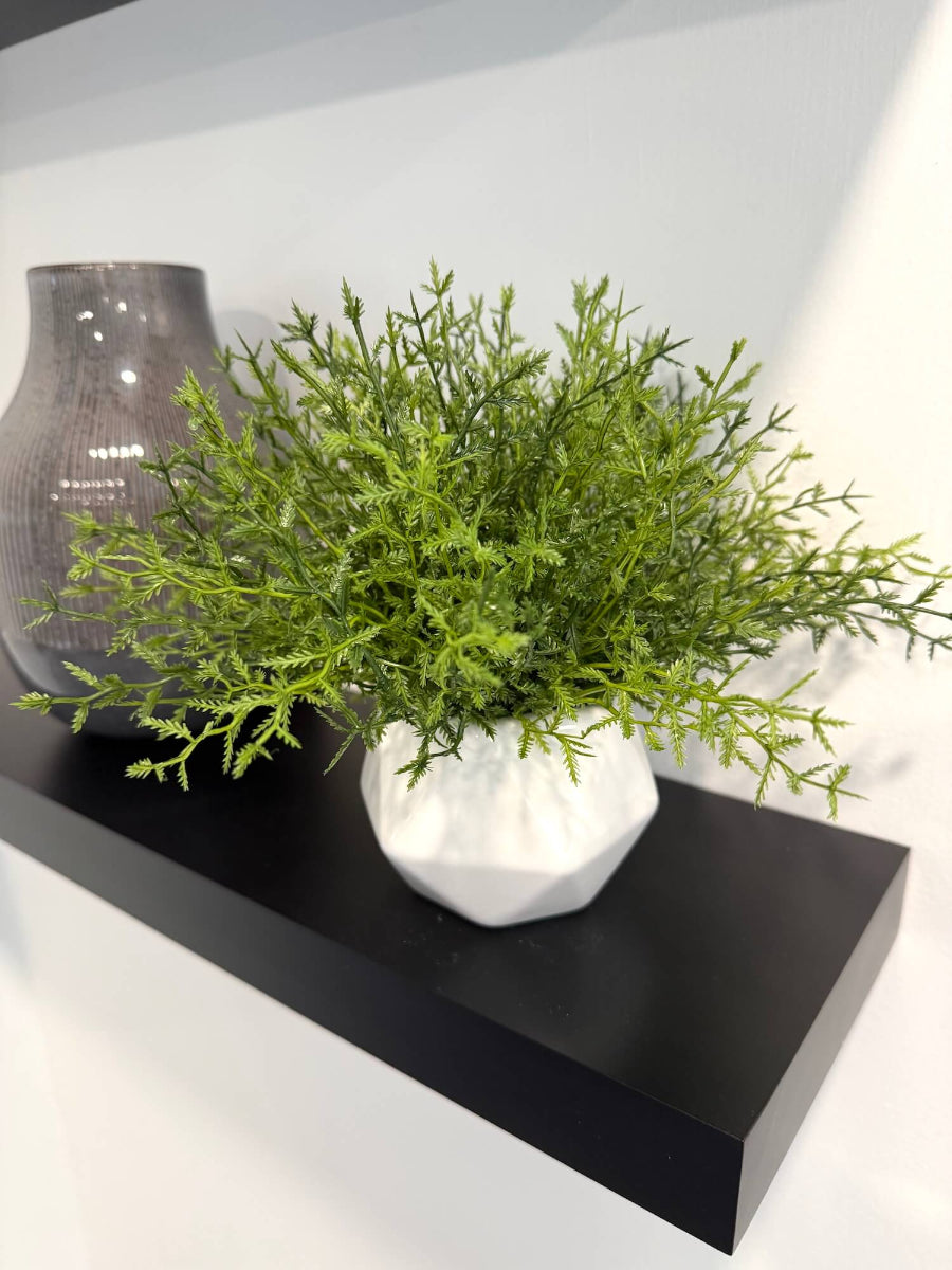 realistic looking small artificial fern planti white ceramic geometric shape pot vase styled on shelf