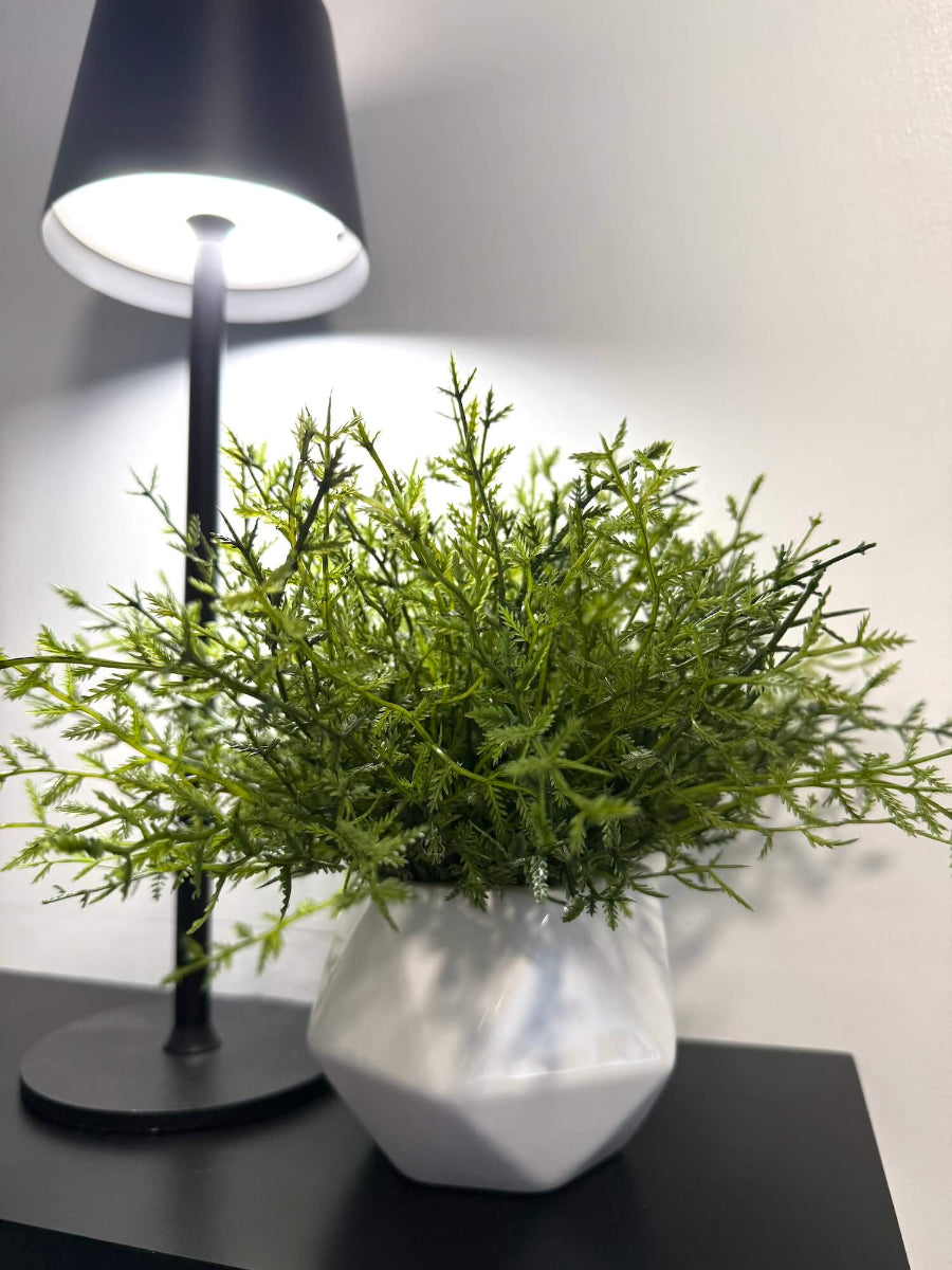 realistic looking small artificial fern planti white ceramic geometric shape pot vase styled on shelf