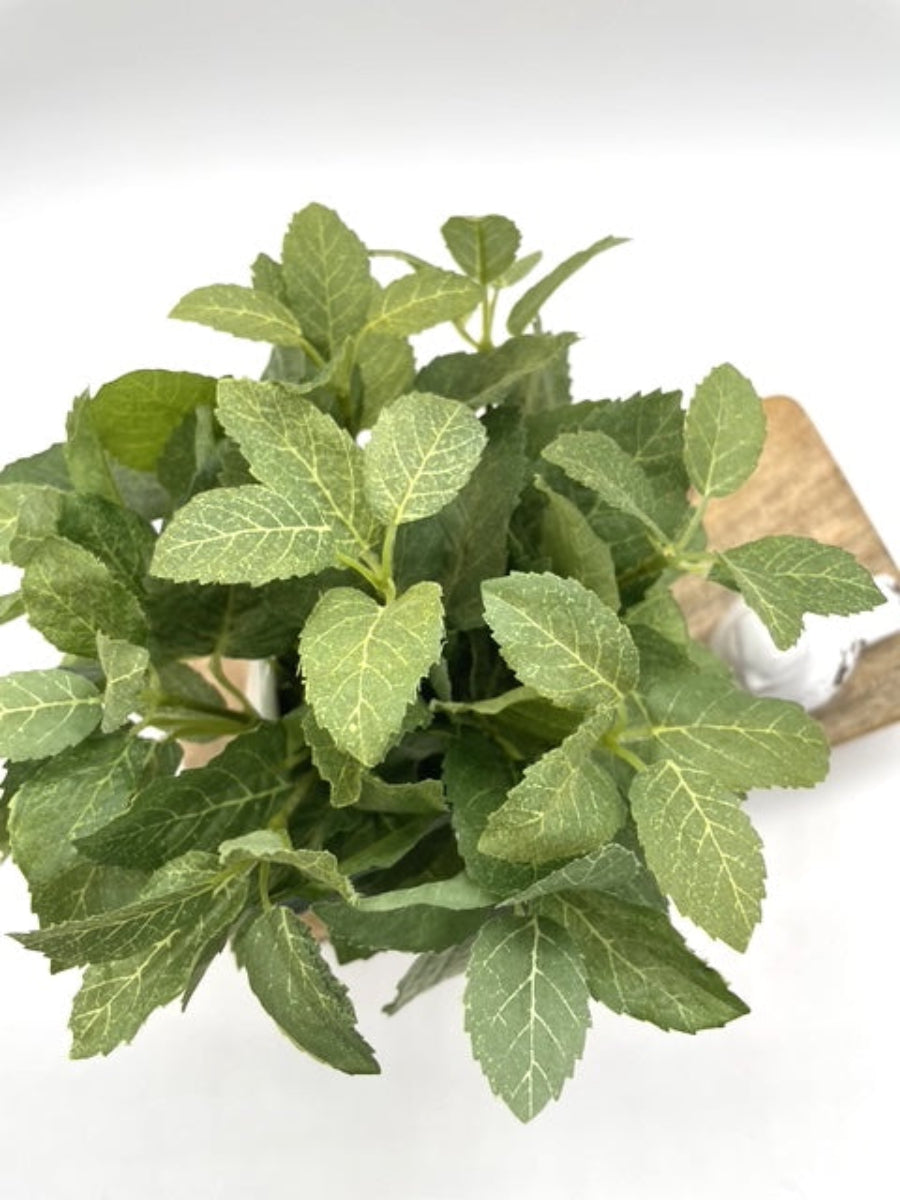 realistic looking faux mint arrangement