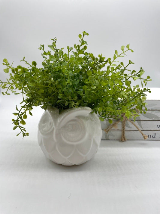 lush vivid green Fake Plant in White Ceramic Owl Pot