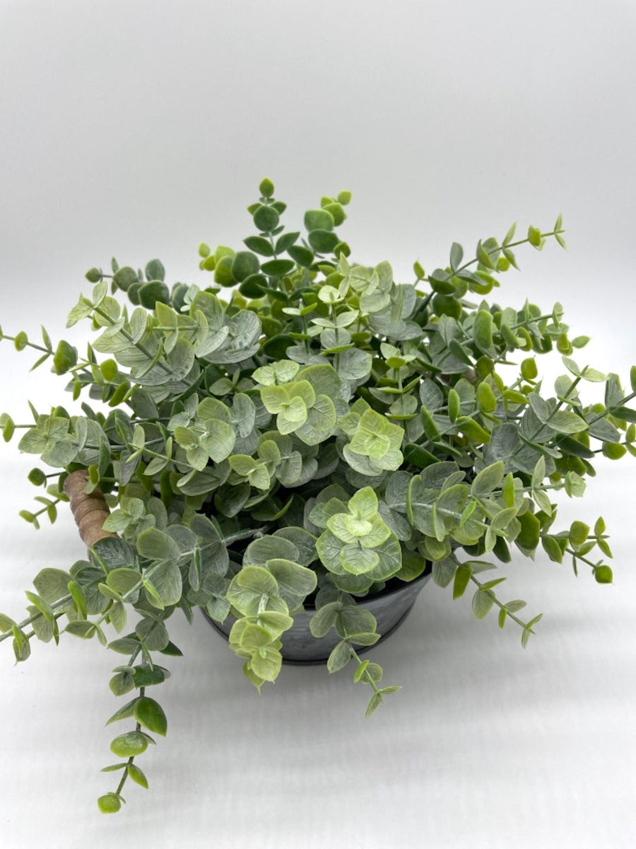 view from top and close up for realistic faux eucalyptus arrangement in round metal galvanized planter with handles in modern farmhouse style