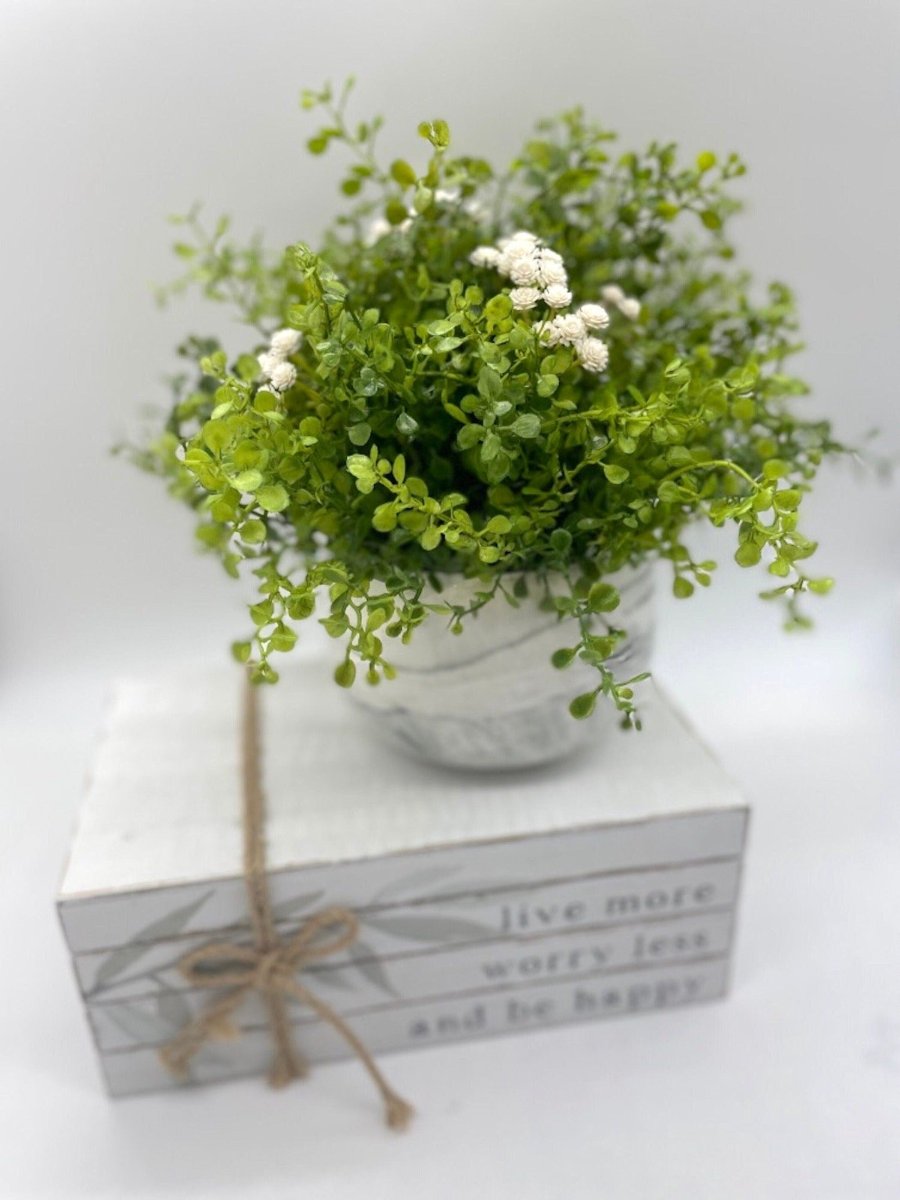 vivid green Faux Plants with whie flowers in marble-like white grayish Ceramic vase